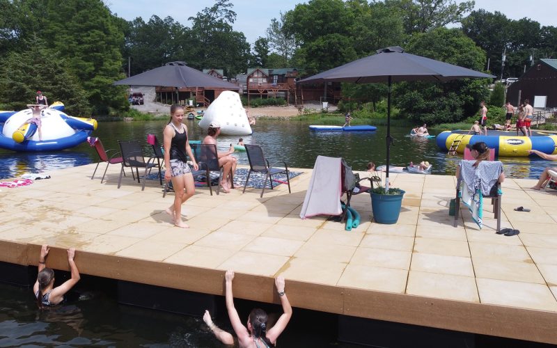 Guests hanging out on the swim dock at Egyptian Hills Resort