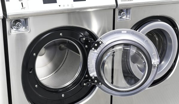 Industrial washing machines in a public laundromat